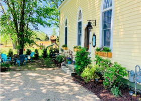 Side yard with the outdoor  fireplace