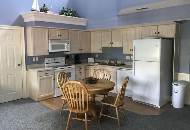 Full kitchen with dining area