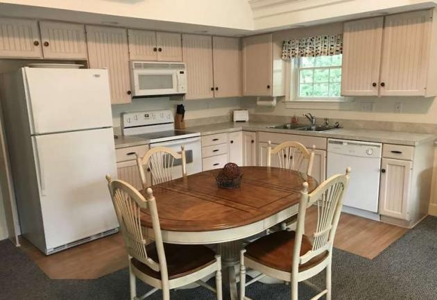 Full kitchen with dining area