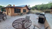 Courtyard, barbecue, tables