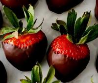 Romance, chocolate-covered strawberries, packages